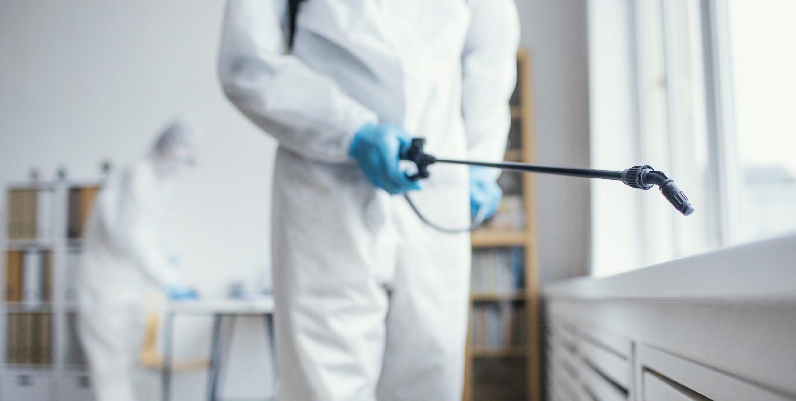 people disinfecting biohazard area scaled e1721131733790